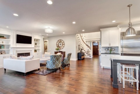 An open living space featuring a kitchen area and living room.